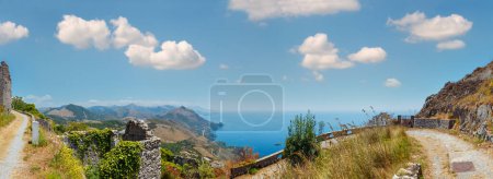 Photo for Summer Tyrrhenian sea coast view from San Biagio mountain hill (path to statue of Christ the Redeemer) and ancient town ruins, Maratea, Basilicata, Italy - Royalty Free Image