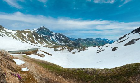 Photo for Summer (June) Alps mountain and winding road (view from Grossglockner High Alpine Road). - Royalty Free Image