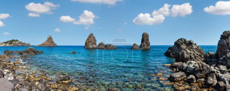 Photo for Cyclopean Coast and the Islands of the Cyclops on Aci Trezza town (Italy, Sicily,10 km north of Catania). Known as Isoles Dei Ciclopi Faraglioni. - Royalty Free Image