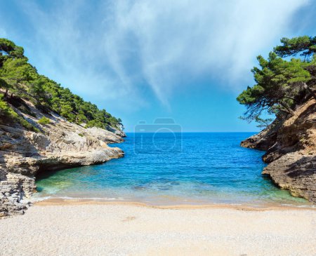 Photo for Summer Baia della Pergola small calm quiet beach, Gargano peninsula in Puglia, Italy. - Royalty Free Image