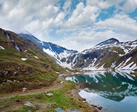 Photo for Alps mountains tranquil summer view (reflections on the lake  near Grossglockner High Alpine Road) - Royalty Free Image