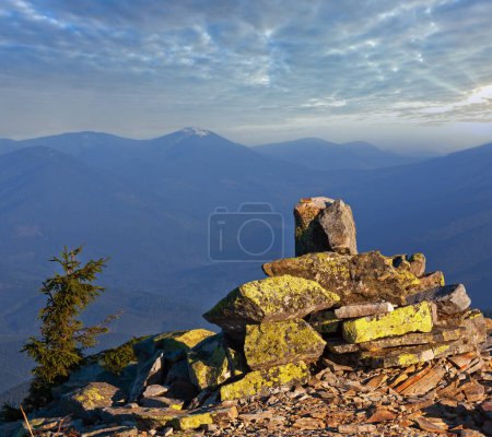 Photo for Stony piles on summer morning Carpathian mountain top. View from stony summit of Ihrovets Mount (Gorgany, Ukraine). - Royalty Free Image