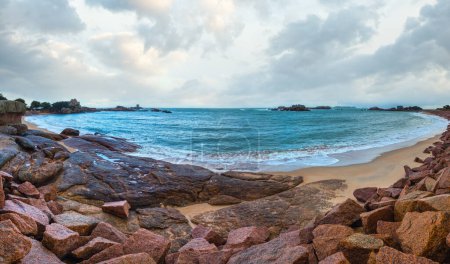 Photo for Tregastel coast morning spring view  (between Perros-Guirec and Pleumeur-Bodou, Brittany, France). The Pink Granite Coast. - Royalty Free Image