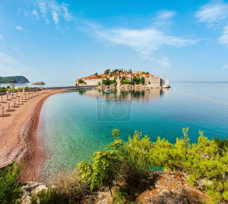 Photo for The view of  Sveti Stefan sea islet with pink sandy Milocer Beach (Montenegro, near Budva) - Royalty Free Image