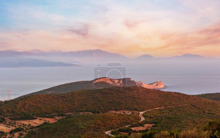 Photo for Evening sunset South cape of Lefkas island and lighthouse panorama (Lefkada, Greece, Ionian Sea). - Royalty Free Image