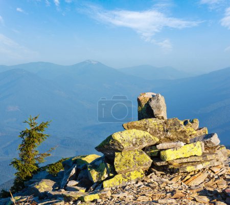 Photo for Stony piles on summer morning Carpathian mountain top. View from stony summit of Ihrovets Mount (Gorgany, Ukraine). - Royalty Free Image