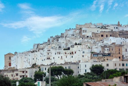 Photo for Panoramic view of Ostuni - white town in Puglia, South Italy (Brindisi province). People unrecognizable. - Royalty Free Image
