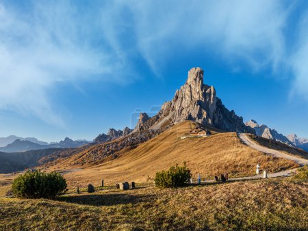Photo for Italian Dolomites mountain (Ra Gusela rock in front) peaceful sunny evening view from Giau Pass. Picturesque climate, environment and travel concept scene. People unrecognizable. - Royalty Free Image