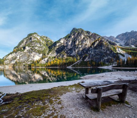 Photo for Autumn peaceful alpine lake Braies or Pragser Wildsee. Fanes-Sennes-Prags national park, South Tyrol, Dolomites Alps, Italy, Europe. Picturesque traveling, seasonal and nature beauty concept scene. - Royalty Free Image