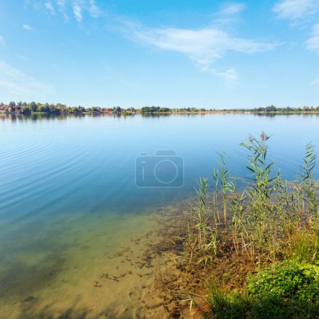 Photo for Picturesque summer  lake calm rushy shore. Concept of tranquil country life, eco friendly tourism, camping, fishing. - Royalty Free Image