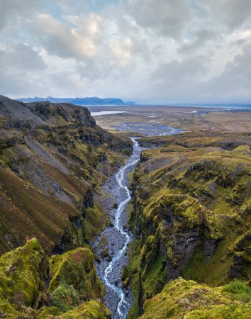 Photo for Beautiful autumn Mulagljufur Canyon, Iceland. It is located not far from Ring Road and Fjallsarlon glacier with Breidarlon ice lagoon at the south end of Vatnajokull icecap and Oaefajokull volcano. - Royalty Free Image