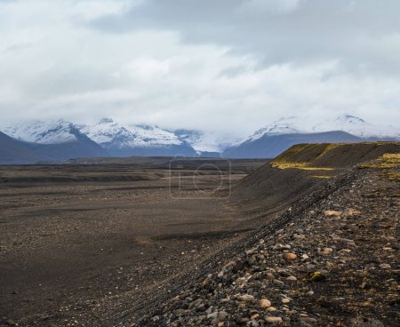 Photo for Iceland autumn tundra landscape near Haoldukvisl glacier, Iceland. Glacier tongue slides from the Vatnajokull icecap or Vatna Glacier near subglacial Esjufjoll volcano. Not far from Iceland Ring Road. - Royalty Free Image