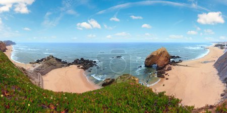 Photo for Sandy beaches Praia do Guincho and Praia de Santa Cruz (Portugal). Misty weather. People are unrecognizable. Three shots stitch panorama. Beautiful natural summer vacation travel concept. - Royalty Free Image