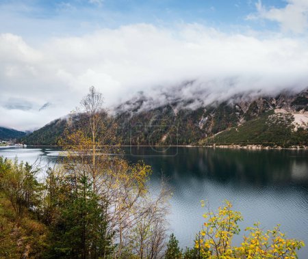 Photo for Mountain alpine autumn lake Achensee, Alps, Tirol, Austria. Picturesque traveling, seasonal and nature beauty concept scene. - Royalty Free Image