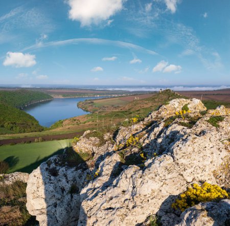 Photo for Ukraine without russian aggression. Amazing spring view on the Dnister River Canyon with picturesque rocks, fields, flowers. This place named Shyshkovi Gorby,  Nahoriany, Chernivtsi region, Ukraine. - Royalty Free Image