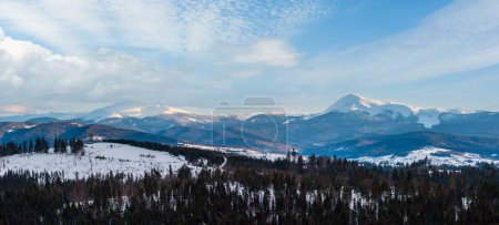 Photo for Evening twilight winter cloudy day snow covered alp mountain ridge (Ukraine, Carpathian Mountains, Chornohora Range - Hoverla, Petros and other mounts, scenery view from Yablunytsia pass). - Royalty Free Image