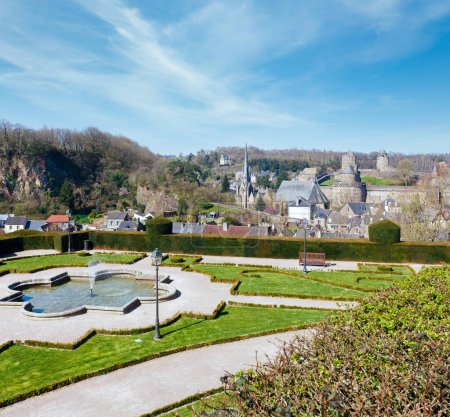 Photo for Spring city park in Fougeres town and Chateau de Fougeres behind (France). Build in XII-XV century . - Royalty Free Image