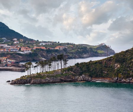 Photo for Summer Lekeitio town coasline and San Nicolas island (isla de San Nicolas), Biscay, Spain,  Basque Country. - Royalty Free Image