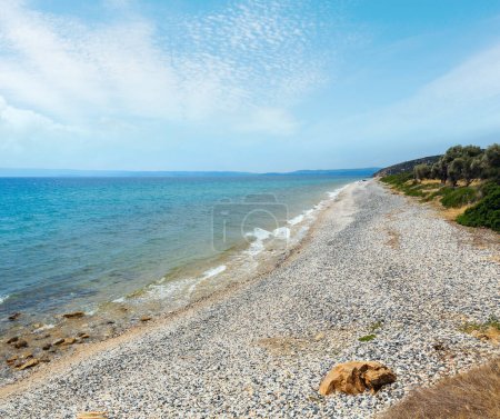 Photo for Summer sea view with pebbly Maori Beach Bar (Gomati, Halkidiki, Greece). - Royalty Free Image