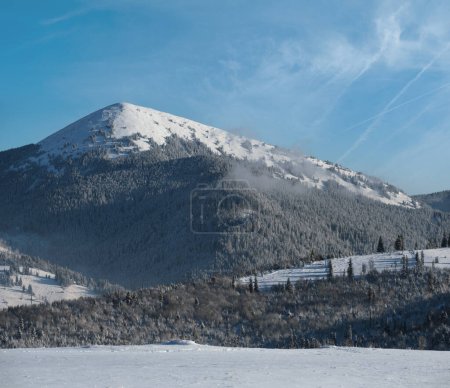 Winter picturesque Gorgany massiv mountains scenery view from Yablunytsia pass, Carpathians, Ukraine.