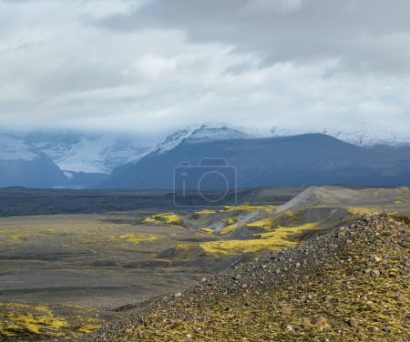 Iceland autumn tundra landscape near Haoldukvisl glacier, Iceland. Glacier tongue slides from the Vatnajokull icecap or Vatna Glacier near subglacial Esjufjoll volcano. Not far from Iceland Ring Road.