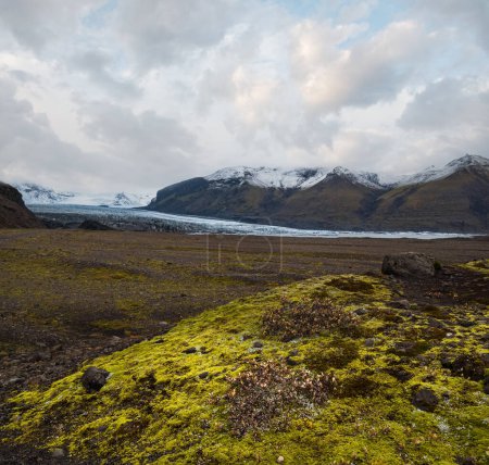 Photo for Iceland autumn tundra landscape near Haoldukvisl glacier, Iceland. Glacier tongue slides from the Vatnajokull icecap or Vatna Glacier near subglacial Esjufjoll volcano. Not far from Iceland Ring Road. - Royalty Free Image