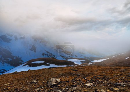 Photo for Evening misty mountain view (near Timmelsjoch - high alpine road on Italian - Austria border) - Royalty Free Image
