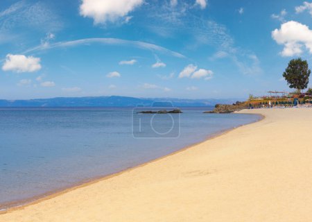 Summer morning sandy Tristinika beach view (Sithonia, Chalkidiki, Greece).