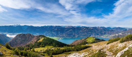 Picturesque autumn Alps mountain lakes view from Schafberg viewpoint, Salzkammergut, Upper Austria. Beautiful travel, hiking, seasonal, and nature beauty concept scene.