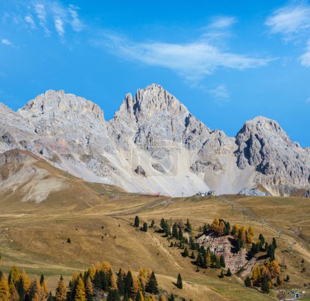 Autumn Dolomites mountain tops view from San Pellegrino Pass environs, Trentino, Dolomites Alps, Italy. Picturesque traveling, seasonal and nature beauty concept scene.