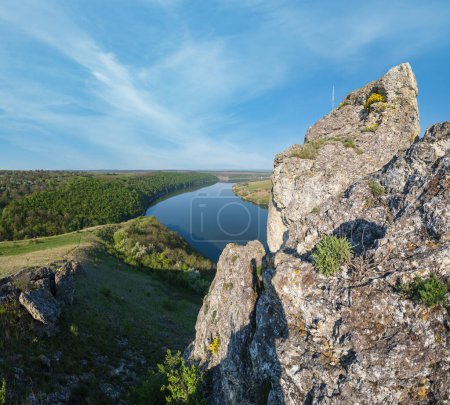 Photo for Amazing spring view on the Dnister River Canyon with picturesque rocks, fields, flowers. This place named Shyshkovi Gorby,  Nahoriany, Chernivtsi region, Ukraine. - Royalty Free Image