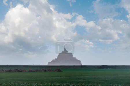 Photo for Mont Saint-Michel in March. Evening hazy view. France. - Royalty Free Image
