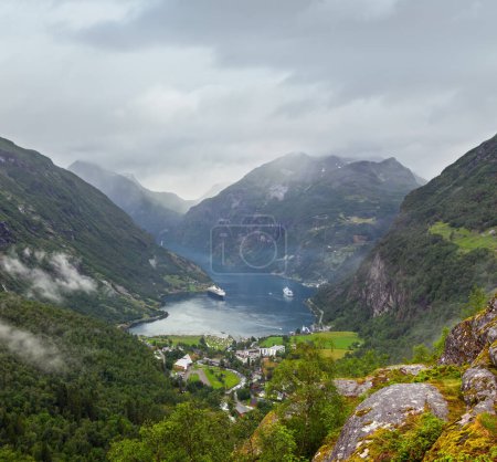 Photo for Geiranger Fjord cloudy summer panorama from above Dalsnibba mount, Norway. - Royalty Free Image