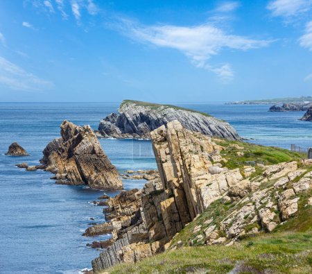 Photo for Atlantic ocean rocky coastline near Portio Beach, (Pielagos, Cantabria, Spain) - Royalty Free Image