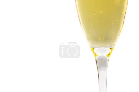 Photo for Close up of a champagne flute filled with sparkling wine isolated on a white background - Royalty Free Image