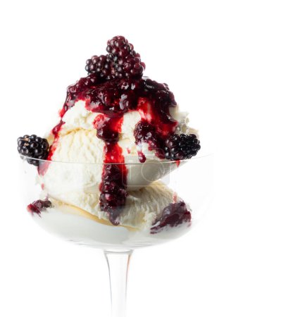 Photo for Fresh wild berries on top of vanilla ice cream isolated on a white background. - Royalty Free Image