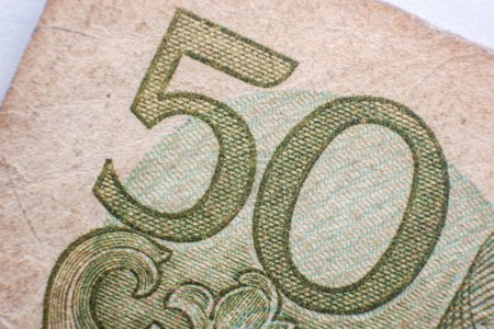 Foto de Primer plano extremo de un viejo billete de papel moneda de Costa Rica, el billete de papel de 50 colones fue reemplazado por una moneda hace años. - Imagen libre de derechos