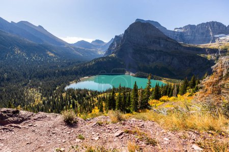 Photo for Beautiful Grinnell Lake in montana with autumn colors in the forest - Royalty Free Image