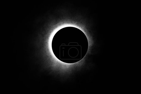 Eclipse image created in a studio using a bright flashlight, a round cap and a can of atmospheric spray for, well, atmosphere. 