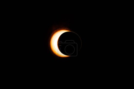 Photo for Eclipse image created in a studio using a bright flashlight, a round cap and a can of atmospheric spray for, well, atmosphere. - Royalty Free Image