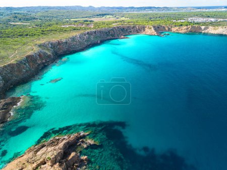 Areal drone view of beautiful bay and Arenal d'en Castell beach on Menorca island, Spain
