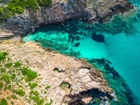 Areal drone view of beautiful bay and Arenal d'en Castell beach on Menorca island, Spain