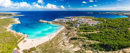 Areal drone view of Arenal de Son Saura beach in summer sunny day at Menorca island, Spain