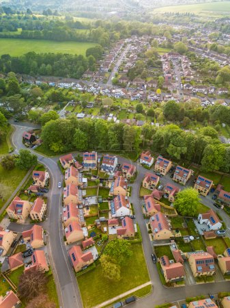 Aerial drone view of the Cane Hill area in Coulsdon, UK, with new houses and parklands.