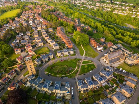 Aerial drone view of the Cane Hill area in Coulsdon, UK, with new houses and parklands.