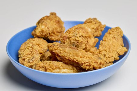 crispy chicken wings in a bowl.