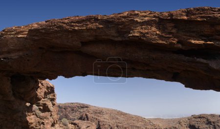 Photo for Spectacular vertical walls of Barranco Hondo, Deep Ravine, Gran Canaria, Canary Islands, rock Arch arco del Coronadero - Royalty Free Image