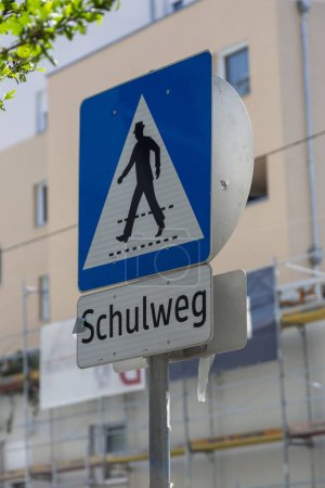 Photo for Road sign "Pedestrian crossing" with the inscription in German "Way to school" - Royalty Free Image