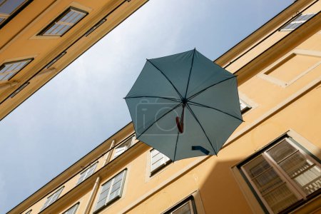 A street in Vienna with suspended umbrellas