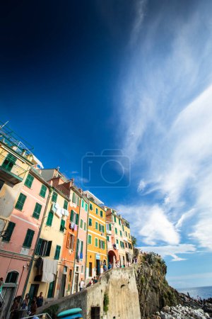 Photo for Riomaggiore of Cinque Terre, Italy - Traditional fishing village in La Spezia, situate in coastline of Liguria of Italy. Riomaggiore is one of the five Cinque Terre travel attractions. - Royalty Free Image